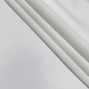 Detailed close-up showing the fine texture and high-density weave of the white fabric