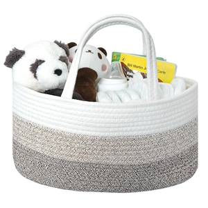 Detailed view of tri-color gradient cotton rope diaper caddy with reinforced handles