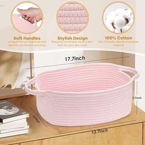 Detail of pink cotton rope basket showing stitching, texture, and large storage dimensions