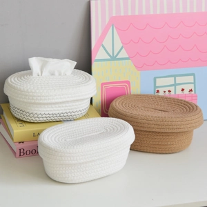 Detailed texture of cotton rope woven tissue boxes in white, brown, and waved patterns