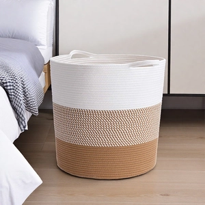 Close-up of a Nordic cotton rope storage basket in a modern minimalist bedroom setting