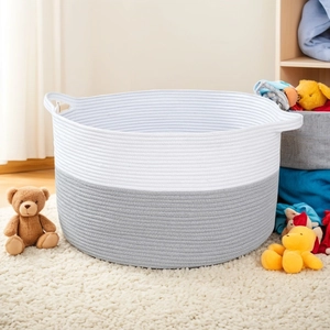 Close-up of dual-tone cotton rope storage basket featuring sturdy built-in handles