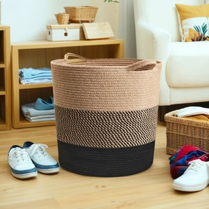 Close-up of three-tone woven cotton rope storage basket with integrated side handles