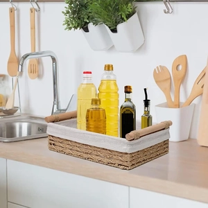 Rectangular woven storage basket with white fabric liner and wooden handles for organization