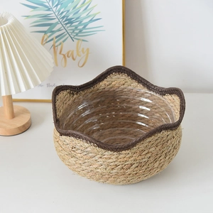 Close-up of handwoven seagrass flower pot with waterproof plastic liner and wavy border