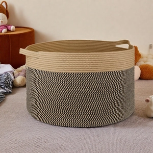 Close-up of cotton rope weave texture and dual-tone pattern on the storage basket