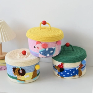 Three-piece set of woven cotton rope baskets with cute 3D plush dogs and red top handles