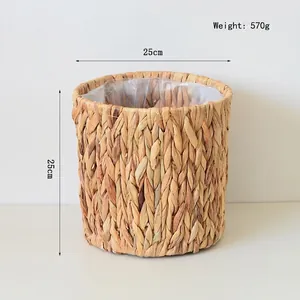 Close-up of woven water hyacinth basket with waterproof plastic lining and size details