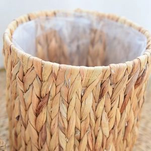 Close-up of handwoven water hyacinth basket with waterproof plastic lining detail