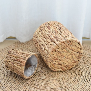 Detailed view of woven water hyacinth plant baskets with waterproof plastic liners