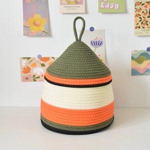 Handwoven cotton rope storage basket with lid in multicolor stripes for home organization