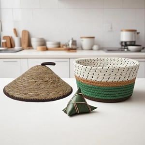 Close-up of woven cylinder gift basket with conical lid in natural fiber texture