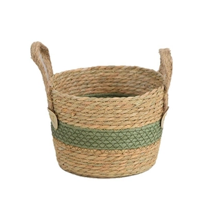Handwoven straw plant basket with green accent and dual handles for home decor