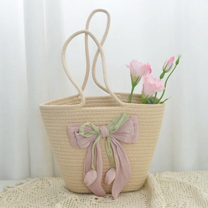 Handmade rainbow cotton woven tote bag with a large bow for beach vacation and casual style