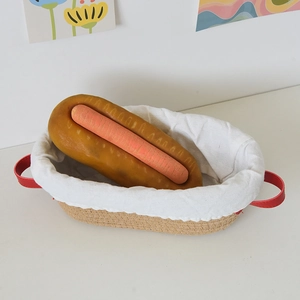 Realistic hot dog squishy toy placed in a woven basket with white cloth lining