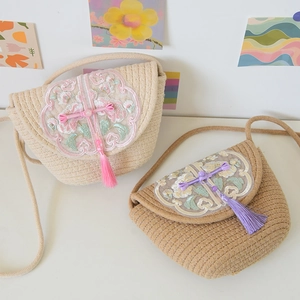 Handwoven ethnic style tote bag with exquisite floral embroidery and tassel detail
