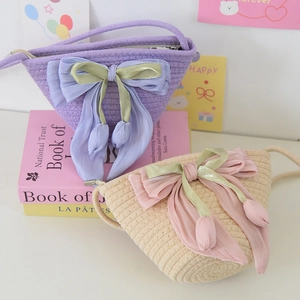 Mini cotton woven straw bucket bag with large chiffon bow and tulip floral charms