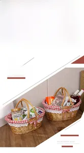 Close-up of handmade wicker picnic basket with red checkered lining and lace trim