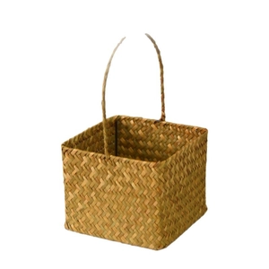 Handcrafted natural woven flower basket with handle for plants and floral arrangements
