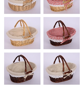 Detail of woven wicker picnic basket with floral cotton lining and delicate lace trim