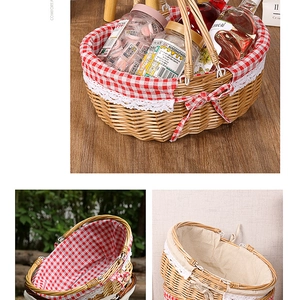 Detail of hand-woven wicker picnic basket with red checkered lace liner and dual handles