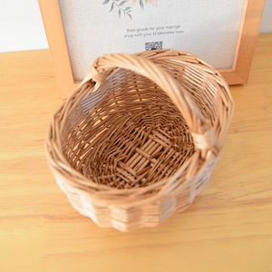 Macro shot of the detailed hand-woven texture on this vintage oval wicker basket