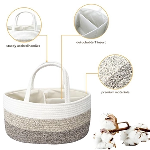 Detail of baby diaper caddy with sturdy handles and detachable T-shaped divider insert