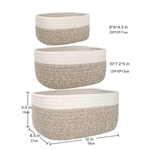 Three-piece set of woven cotton rope baskets in white and grey with detailed size dimensions