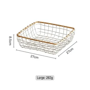 Close-up of large iron mesh storage basket with wooden rim measuring 27x27x8.5cm
