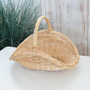 Detail of handwoven wicker basket texture with sturdy handle for kitchen storage