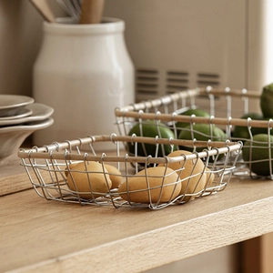 Minimalist iron wire storage basket with wooden rim for fruit and vegetable organization