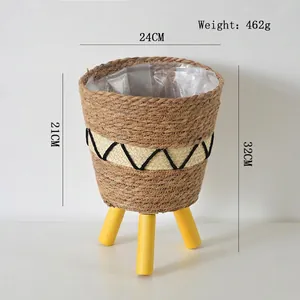 Detail showing dimensions of woven plant basket with waterproof liner and tripod wooden legs