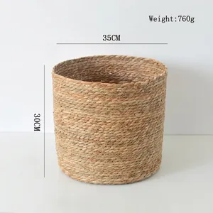 Detail view of woven straw flower basket with dimensions 35cm diameter and 760g weight