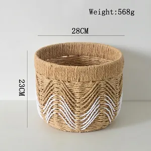 Detail showing dimensions of round woven storage basket with white wave pattern design