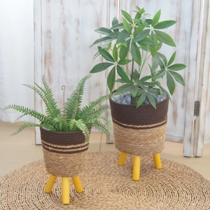Nordic woven plant baskets with wooden legs in two sizes for home decoration