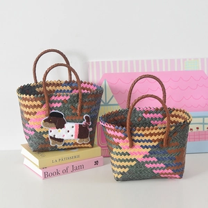 Handmade colorful woven tote bags with cute puppy embroidery and brown handles for picnics