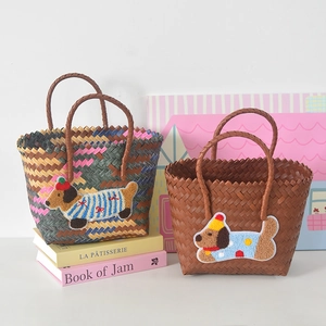 Detailed macro view of hand-woven plastic tote baskets with cute plush puppy patches