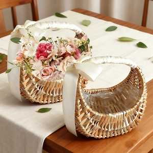 Detail of hand-woven flower baskets with satin handles and waterproof lining