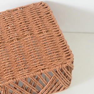 Detail shot of the tight weave texture and breathable diamond grid of the storage basket