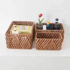 Three-piece set of woven storage baskets for home organization in various sizes