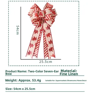 Detailed view of dual-layer Christmas bow with red stripes and maple leaf prints, 54x25.5cm