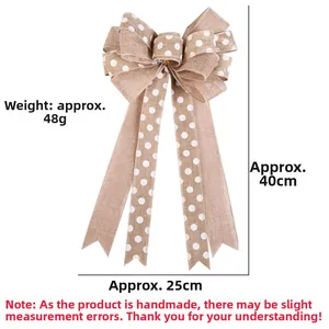 Close-up of burlap bow decoration showing dimensions 40x25cm and white polka dot pattern