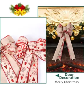 Macro detail of large linen Christmas bow with red reindeer prints and festive patterns
