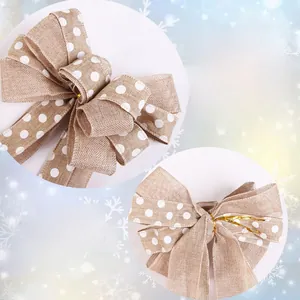 Detail of Christmas faux linen bows with white polka dots and flexible wired edges