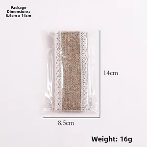 Detail view of natural jute burlap ribbon roll with white lace trim in packaging