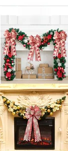 Detail of Christmas bows with snowflake and maple leaf patterns in rustic linen fabric