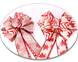 Detail of large double-layered Christmas bows with snowflake and maple leaf patterns