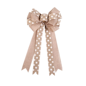 Christmas burlap bow with white polka dots for tree decoration and holiday gift wrapping