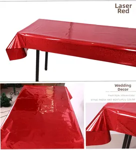 Detail of red laser table cloth with metallic glitter texture for party wedding decor