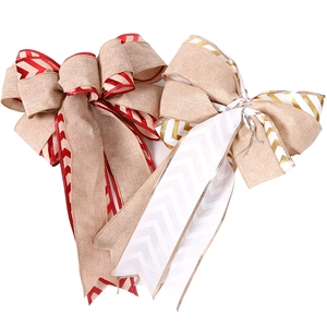 Handmade double-layered Christmas tree bows with rustic linen texture and glitter wave patterns
